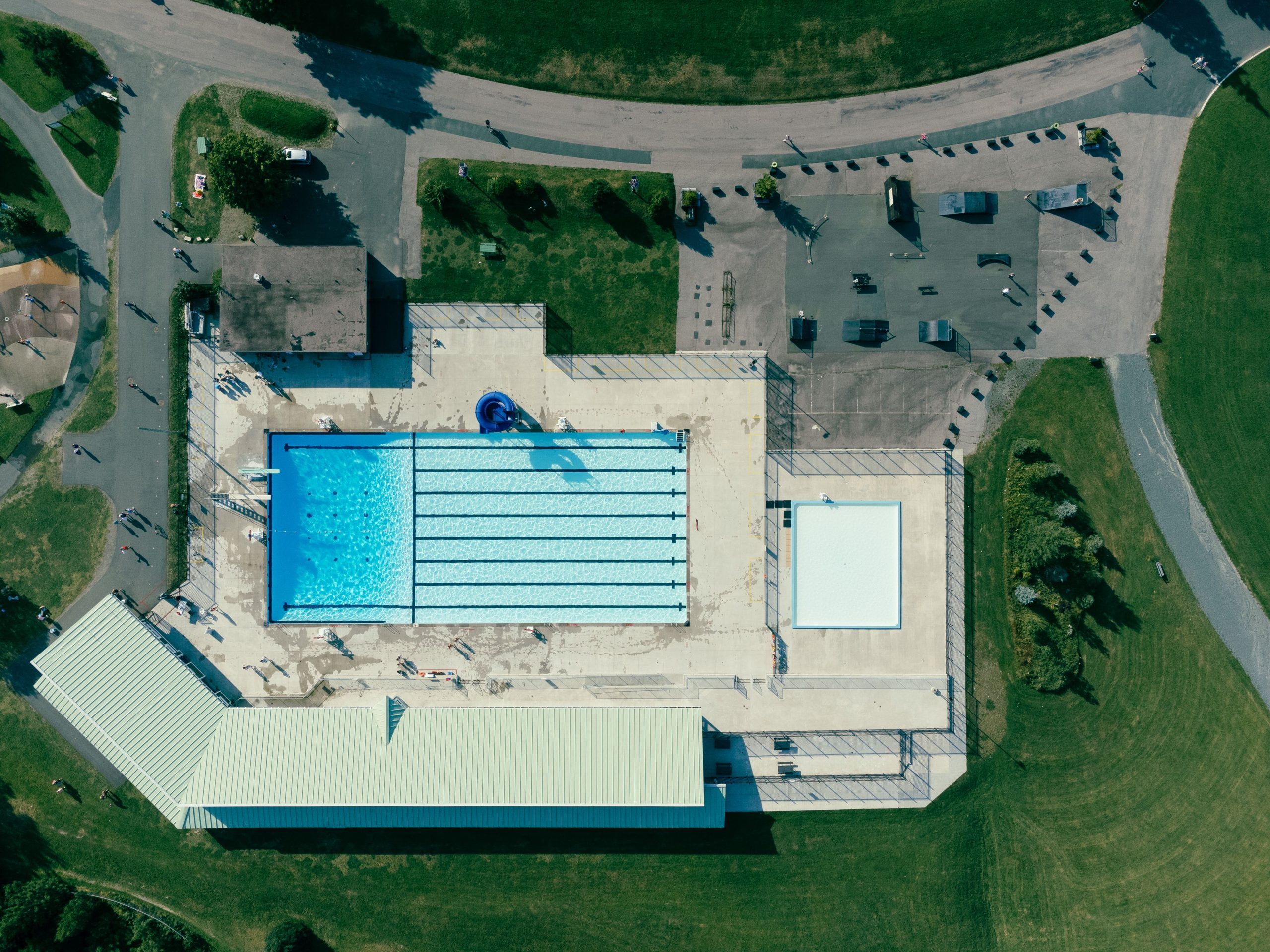 Aerial view of an outdoor swimming pool complex